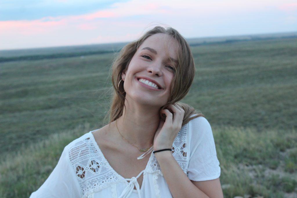 A young lady experiencing feelings of inner peace while practicing spiritual growth